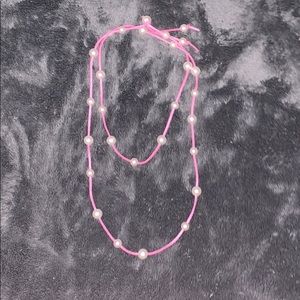 Pink pearled necklace